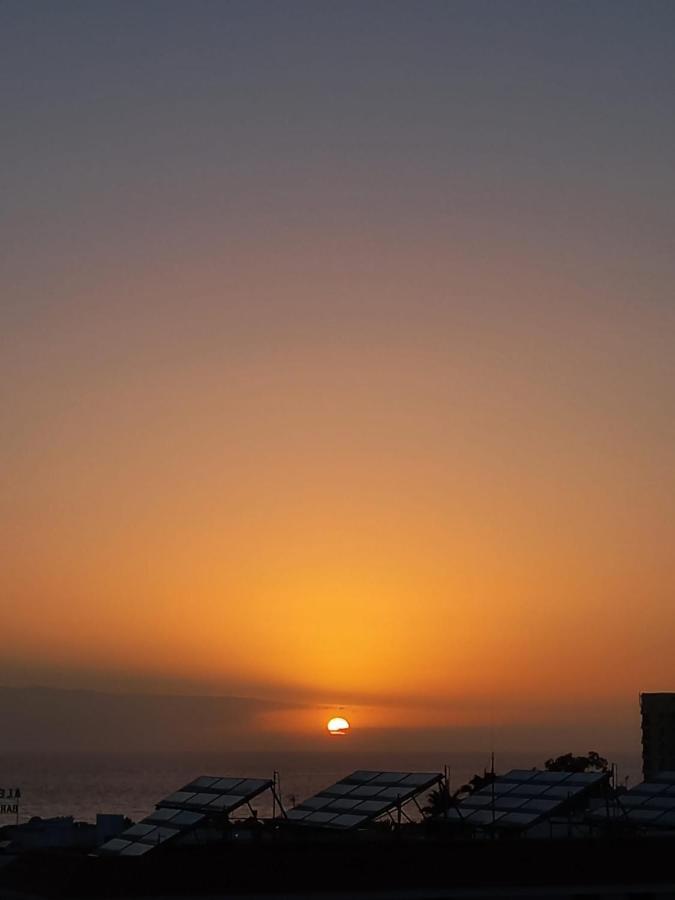 Sunset over the sea Playa de las Americas  Eksteriør bilde